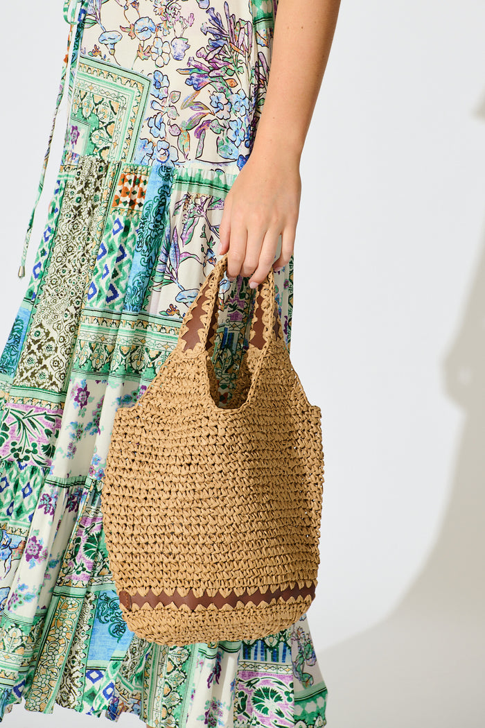 Esme Woven Bag in Natural with Pattern Trim on model side