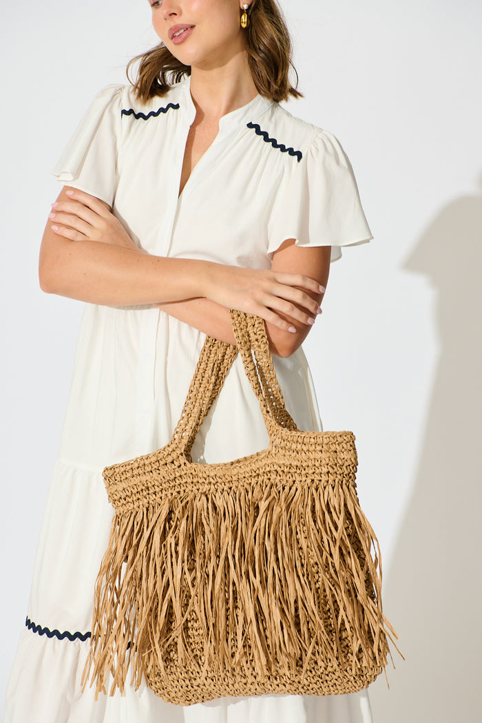 Frisco Fringe Shoulder Tote Bag in Natural Raffia on model side
