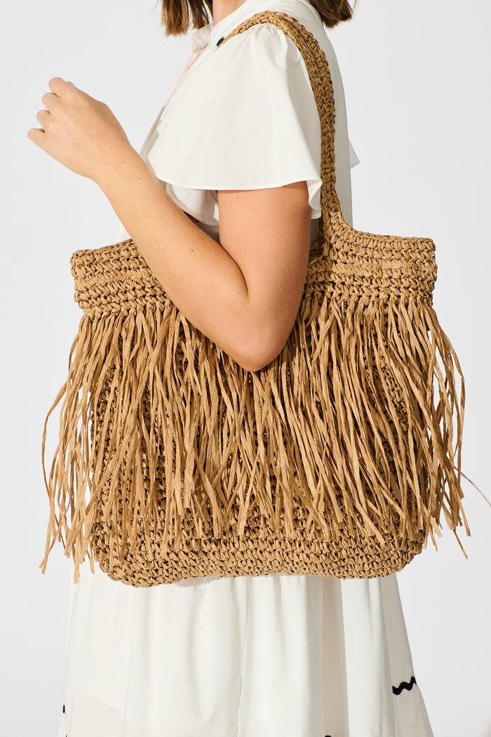 Frisco Fringe Shoulder Tote Bag in Natural Raffia on model side