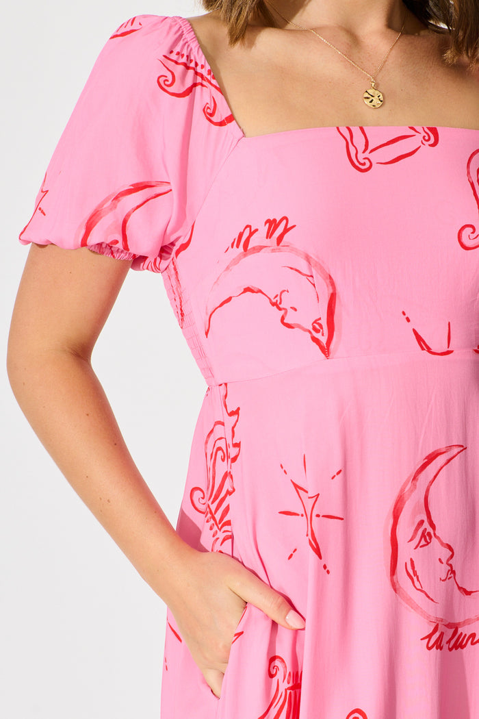 Ciniza Maxi Dress in Pink with Red Print detail