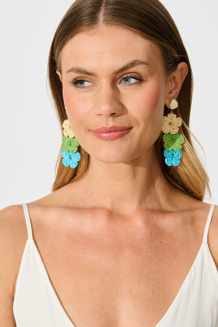 Patty Drop Earrings in Multi Cream and Aqua Raffia on model front