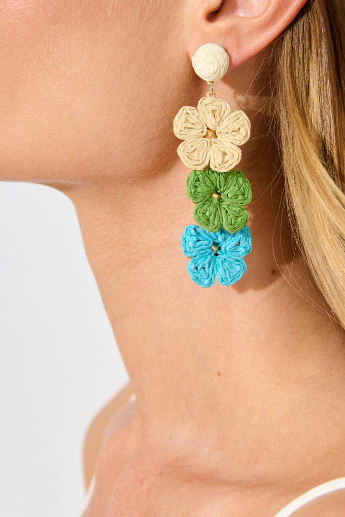 Patty Drop Earrings in Multi Cream and Aqua Raffia on model close up