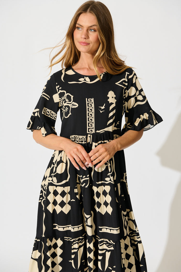 Layana Midi Dress in Black with White Print front