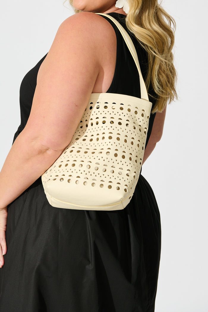 Bianca Tote Bag in White Laser Cut on model side