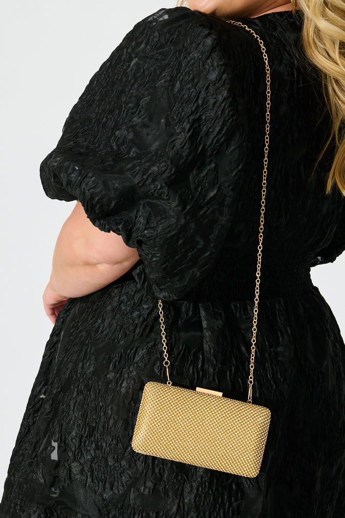 Stella Evening Clutch in Gold Crystal Mesh on model back