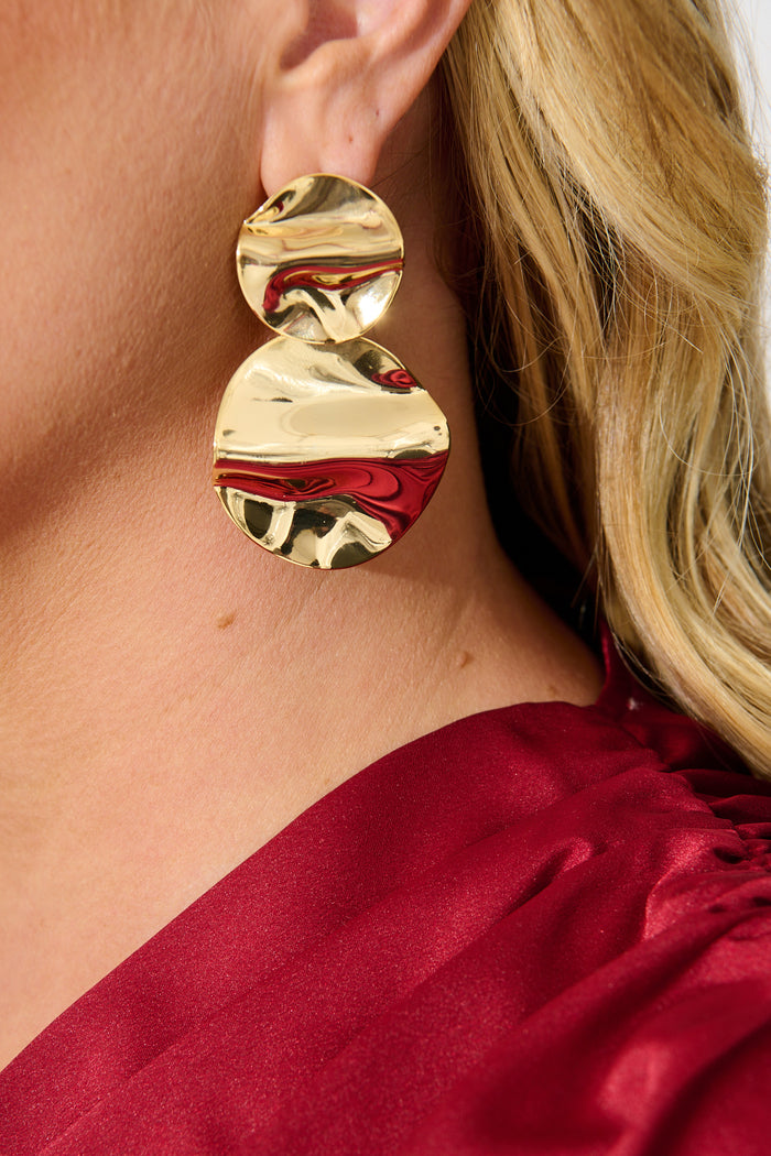Sarai Drop Earrings in Gold Textured on model close up