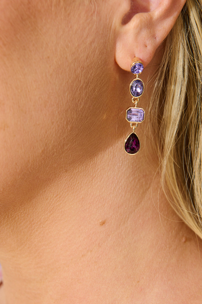 Lisa Drop Earrings In Multi Purple on model close up