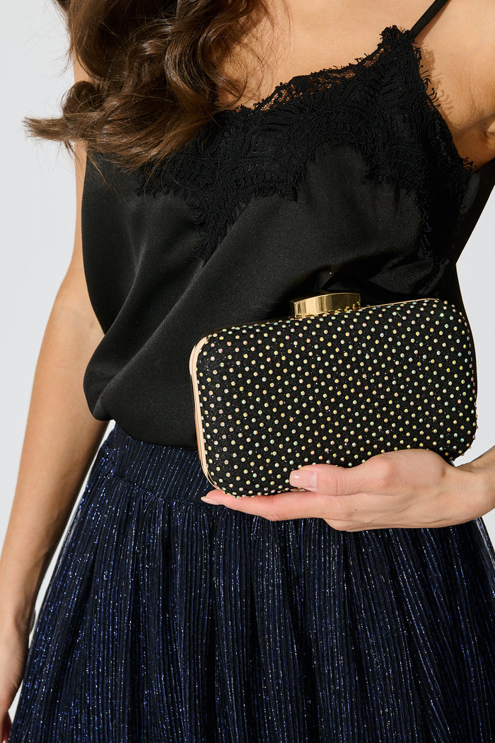 Romy Evening Clutch in Black Mesh Rhinestones on model side