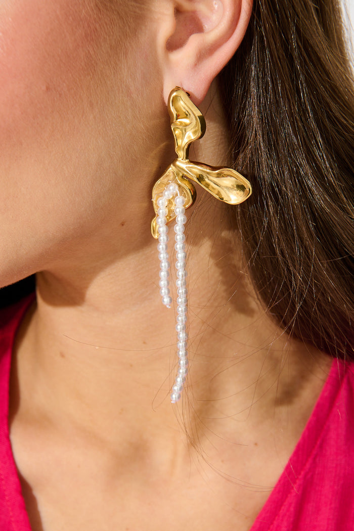 Thalia Earrings Earrings in Gold with Pearl on model close up