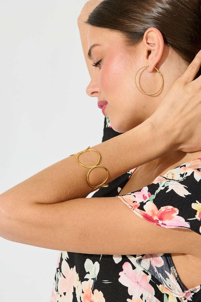 Liora Open Cuff Bangle in Gold on model side