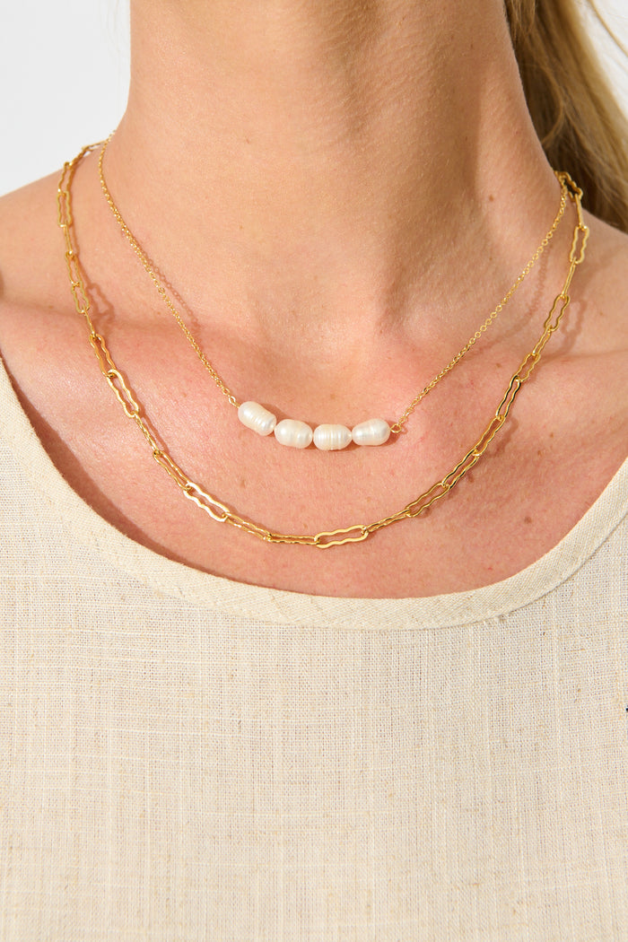 Celina Layered Necklace in Gold with Pearl on model close up