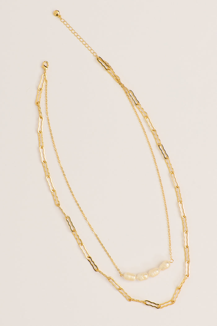 Celina Layered Necklace in Gold with Pearl flatlay