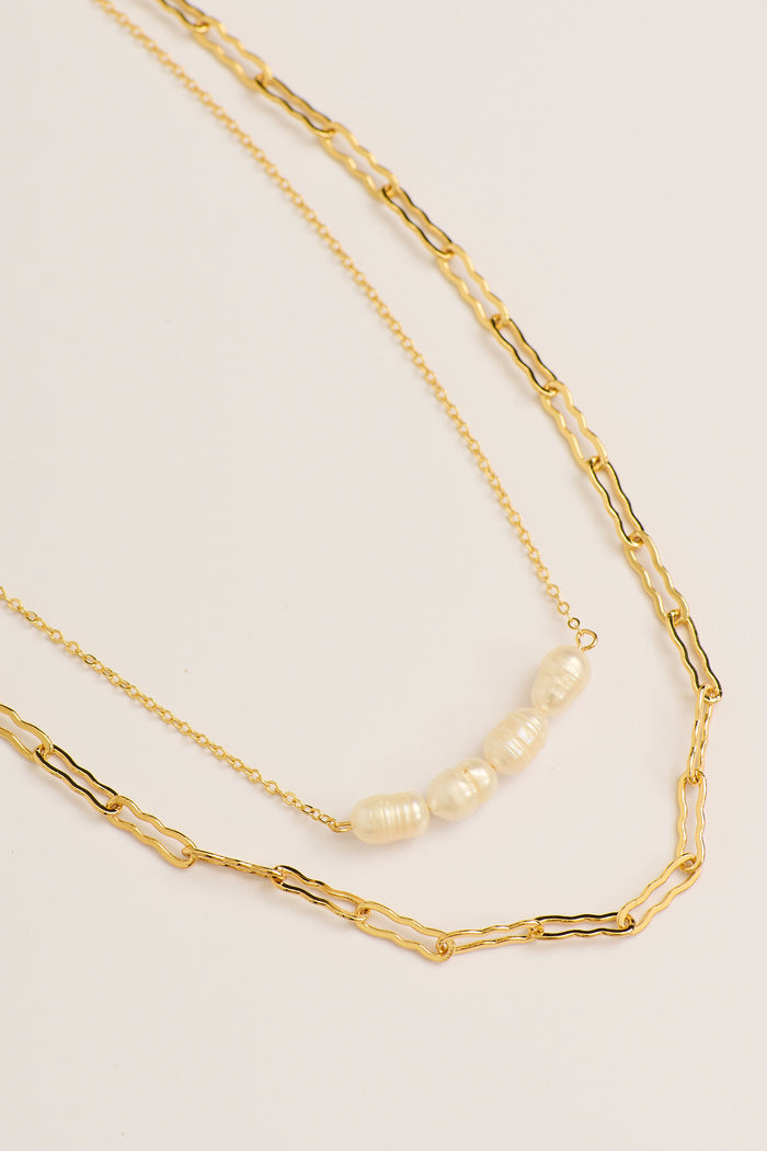 Celina Layered Necklace in Gold with Pearl flatlay close up