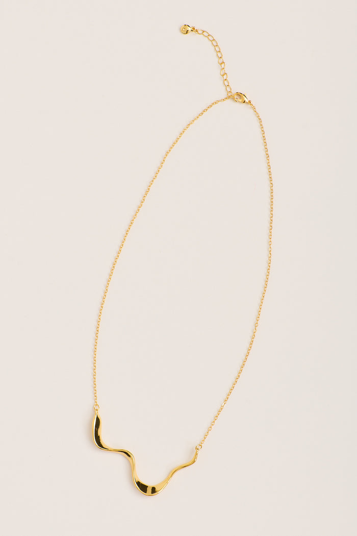 Kaia Molten Necklace in Gold flatlay