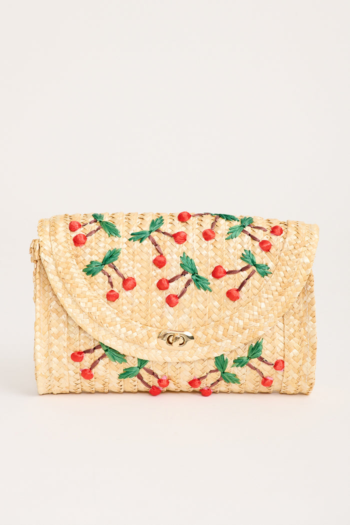 Clara Cherry Embroidered Straw Crossbody Bag in Natural flatlay