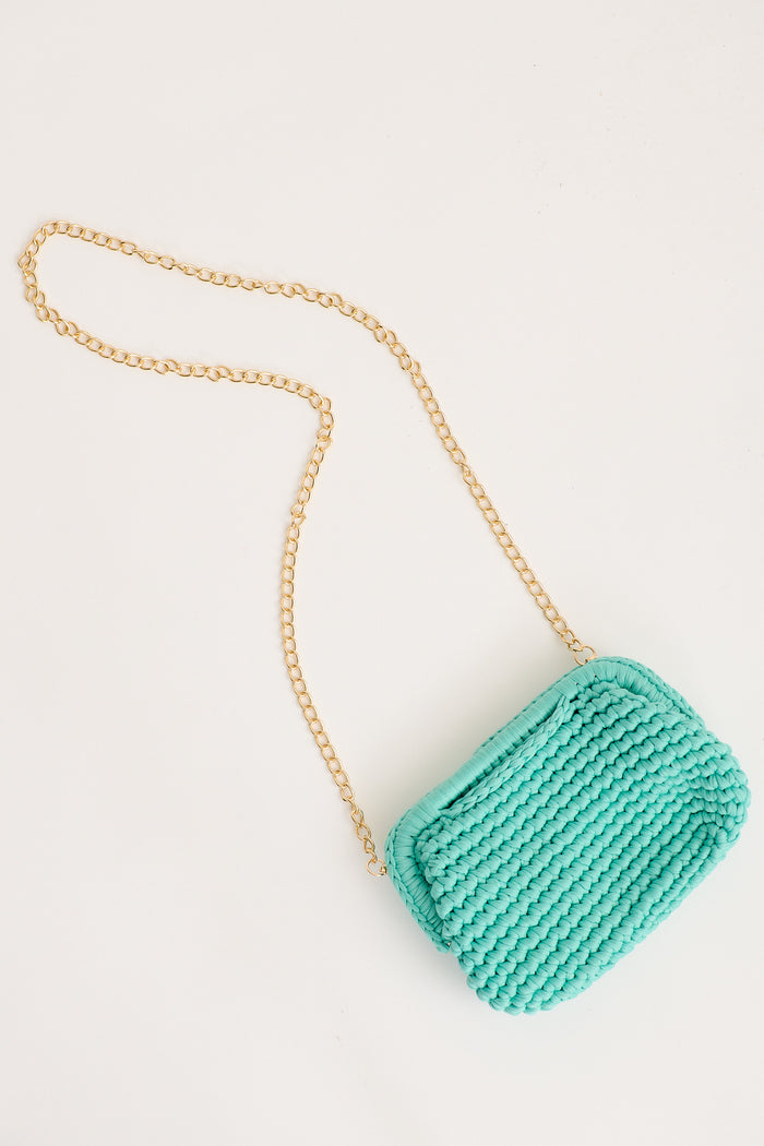 Malacca Cross Body Clutch Bag in Aqua Crochet flatlay strap