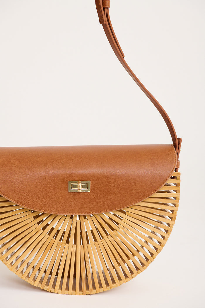Noely Crossbody Saddle Bag in Tan Bamboo flatlay close up