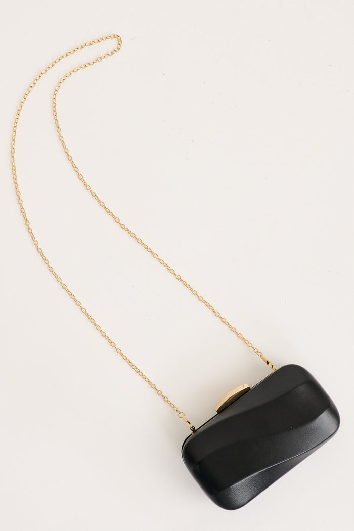 Giselle Evening Clutch in Black flatlay strap