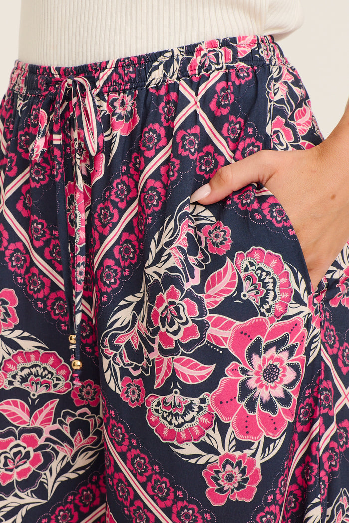 Cambree Pants in Navy with Pink Floral Tiles Print detail