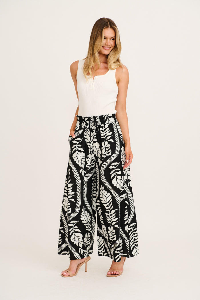 Goldie Wide Leg Pant in Black with White Leaf Print full length