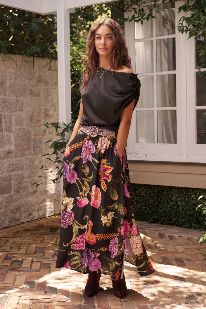 Aurora Radiance Maxi Skirt in Black with Multi Floral campaign full length