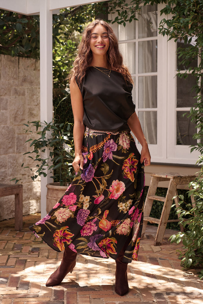 Aurora Radiance Maxi Skirt in Black with Multi Floral campaign full length