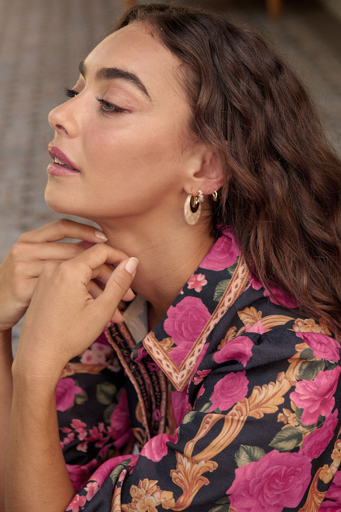 Talia Hoop Earrings in Gold with Cream Marble campaign on model side
