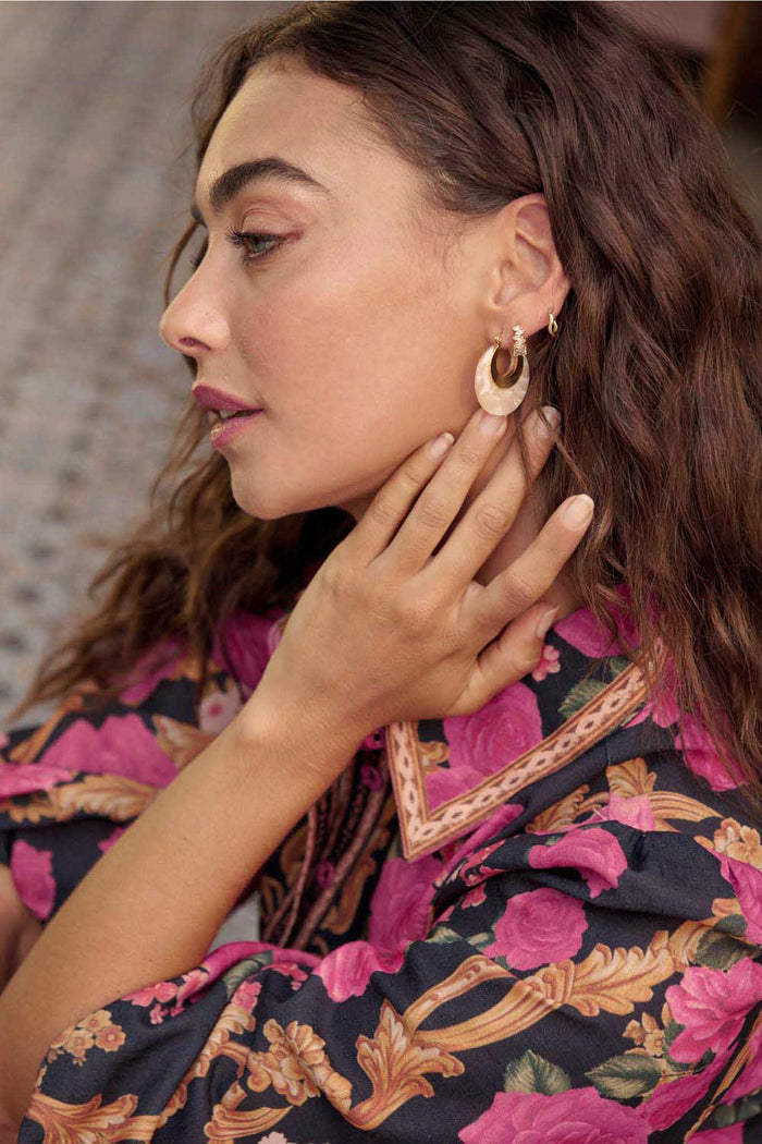 Talia Hoop Earrings in Gold with Cream Marble campaign on model side
