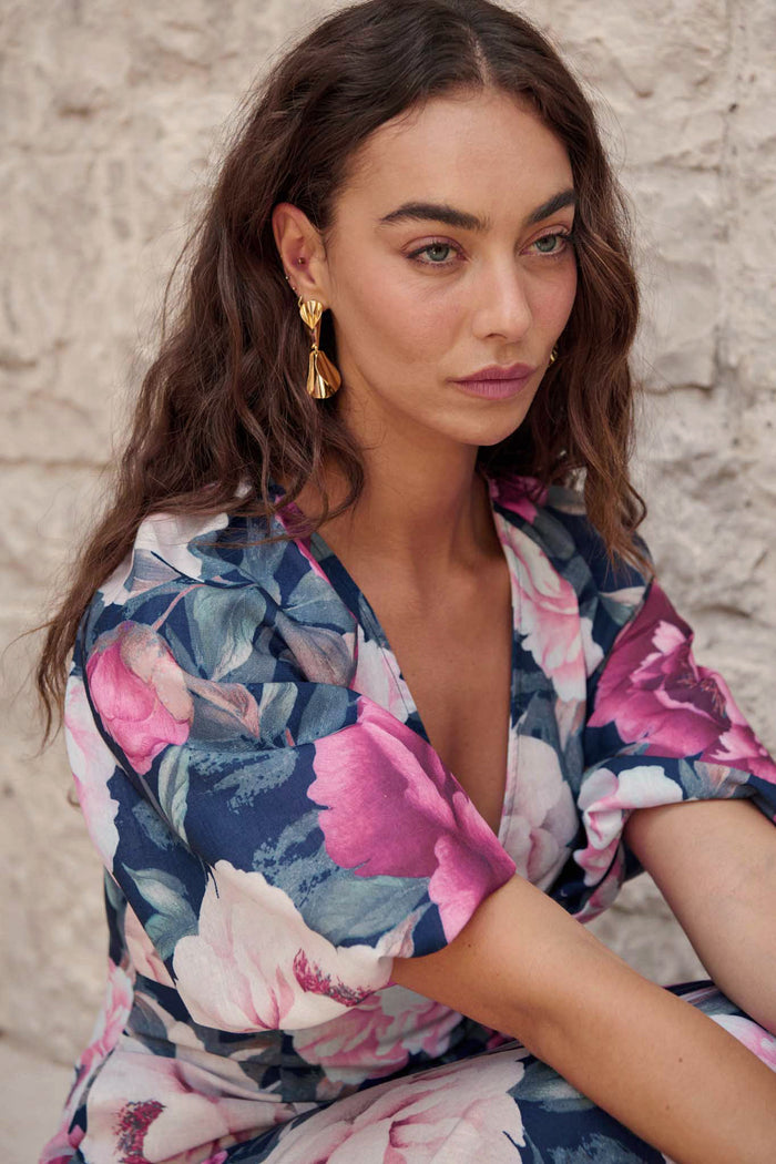 Clio Drop Earrings in Gold on model side