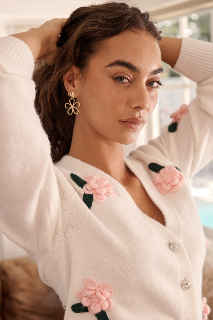 Fleur Bloom Drop Earrings in Gold Outline campaign on model side