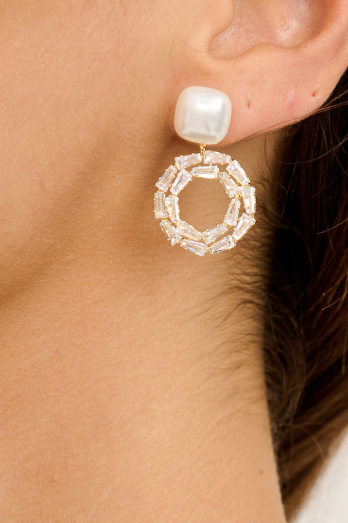 Clarisse Earrings in Gold with Pearl on model close up