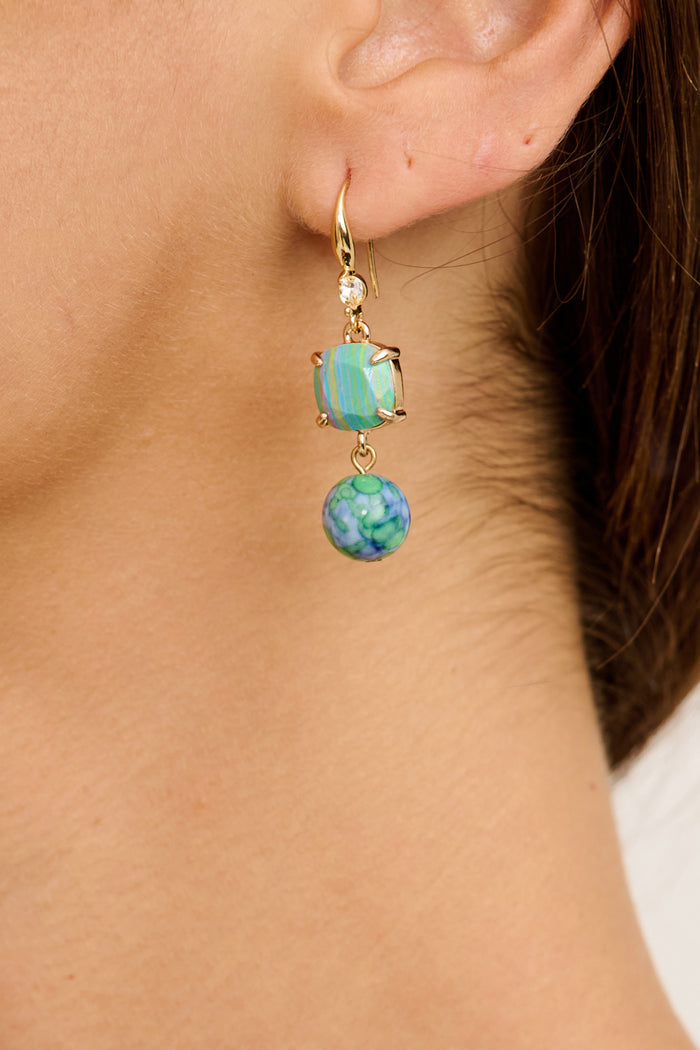 Luna Dangle Earrings in Baby Blue Beads on model close up