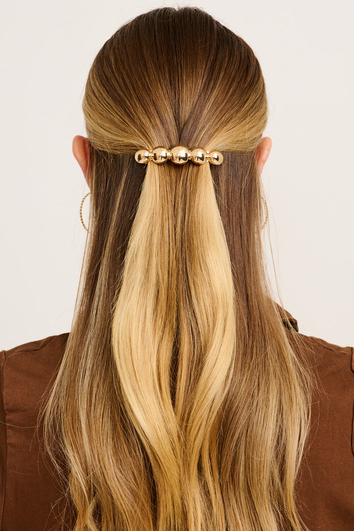 Lumi Pearl Hair Clip in Gold on model back