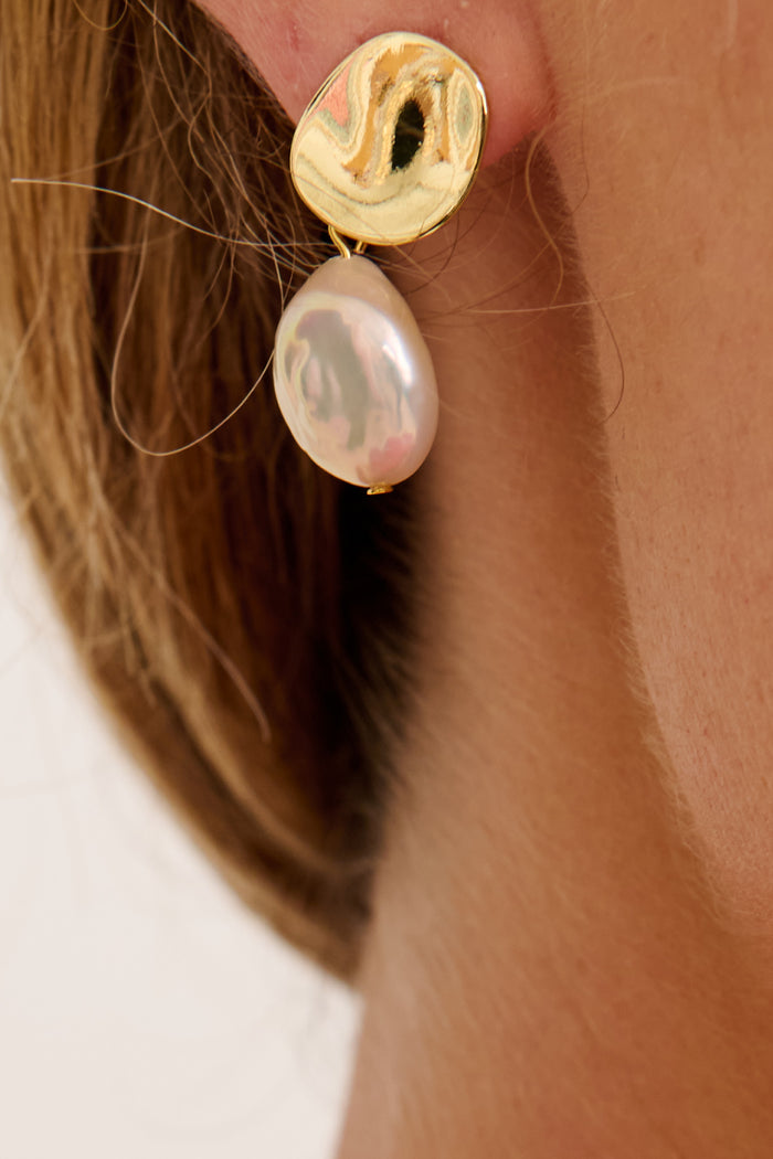 Anya Drop Earrings in Gold with Pearl on model close up