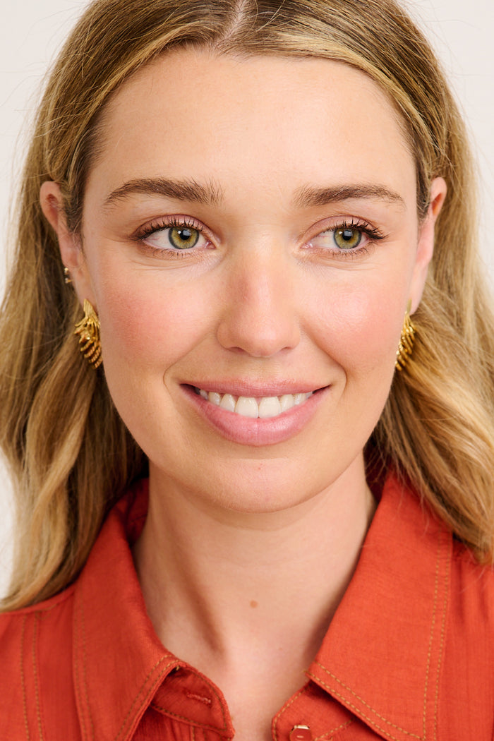 Lumi Earrings in Gold on model front