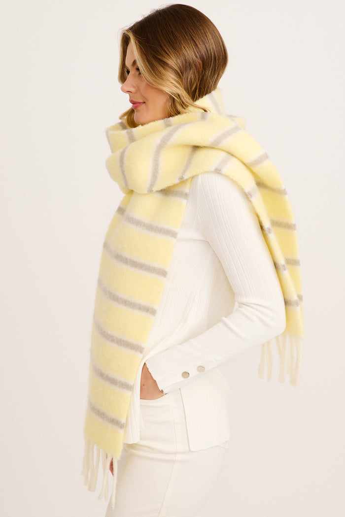 Chloe Knit Scarf in Butter Yellow Stripe on model side