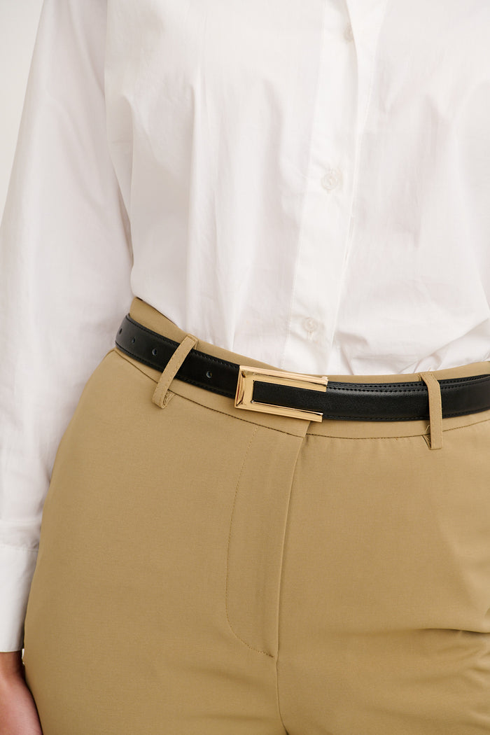 Valencia Waist Belt in Black with Gold Buckle on model close up