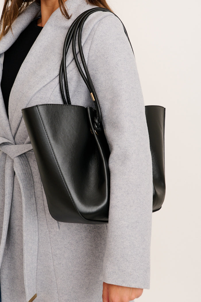 Harper Tote Bag in Black on model shoulder