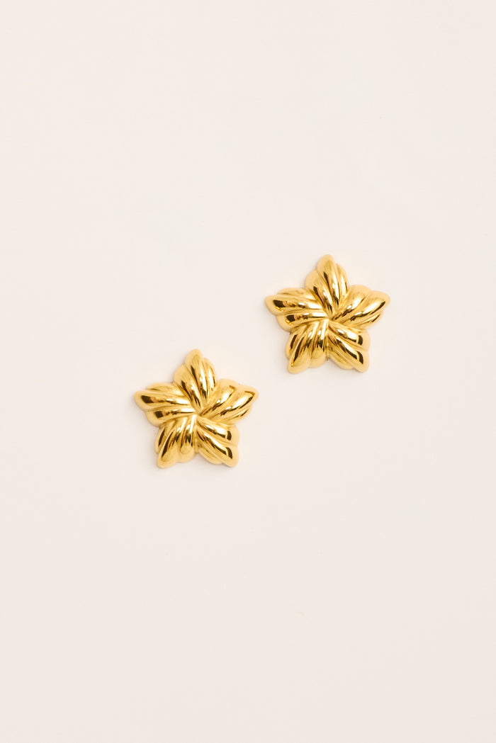 Veda Floral Stud Earrings in Textured Gold flatlay