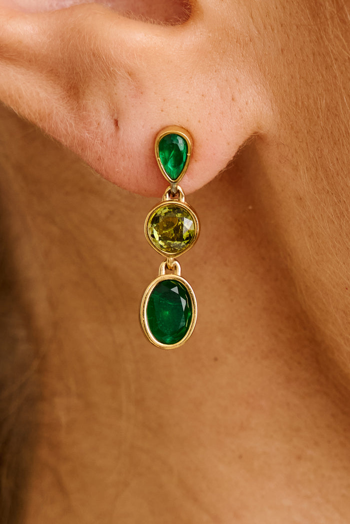 Enora Drop Earrings in Green Gemstones on model close up