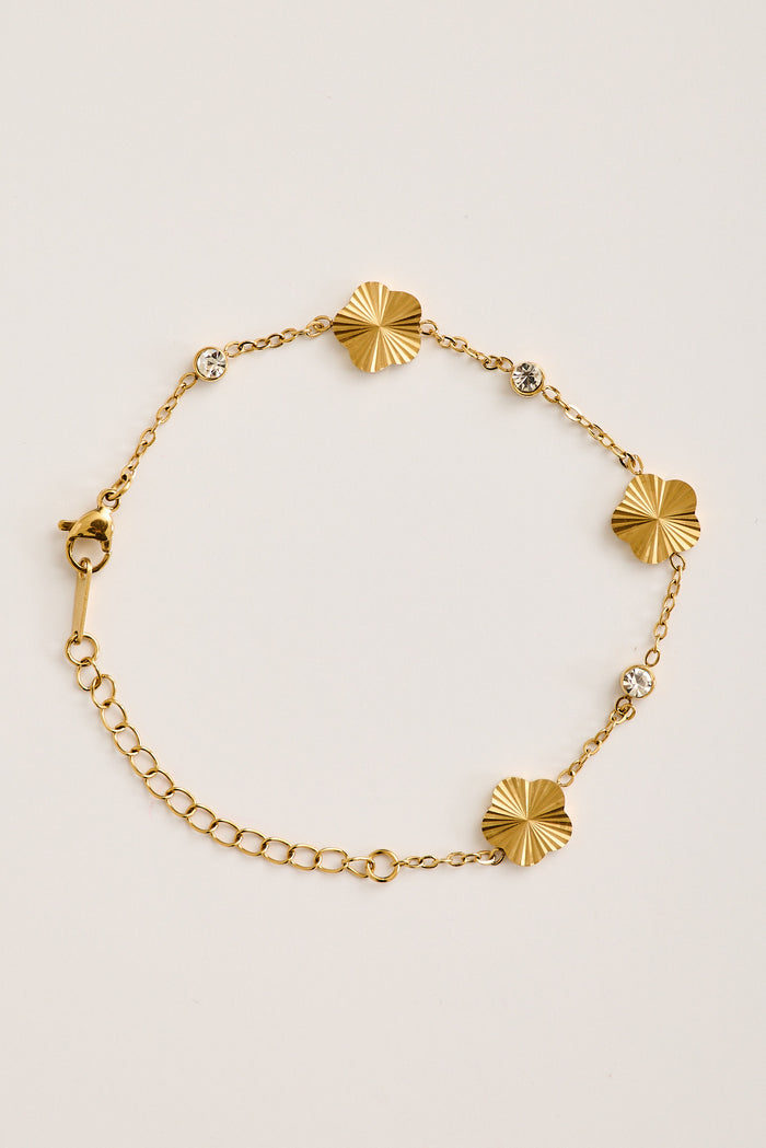 Inez Flower Chain Bracelet in Gold with Pearl Detail flatlay