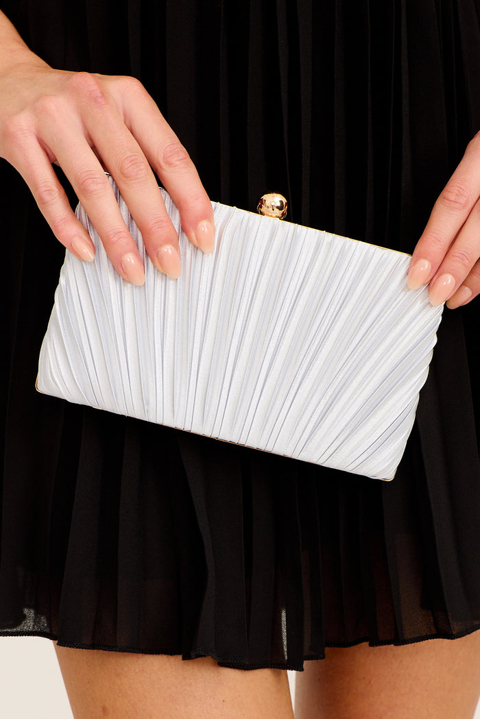 Silver Amina clutch styled