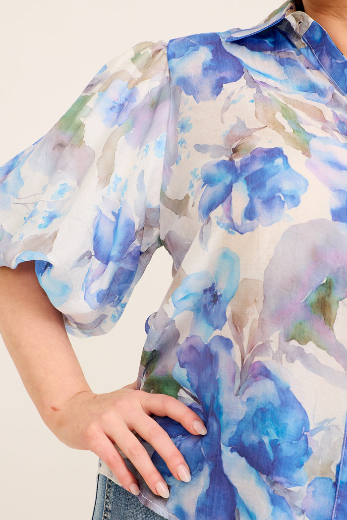 Blue floral shirt detail close-up