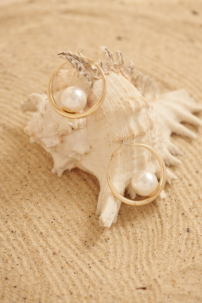 Sandra Hoop Earrings in Gold with Pearl focus shoot flatlay