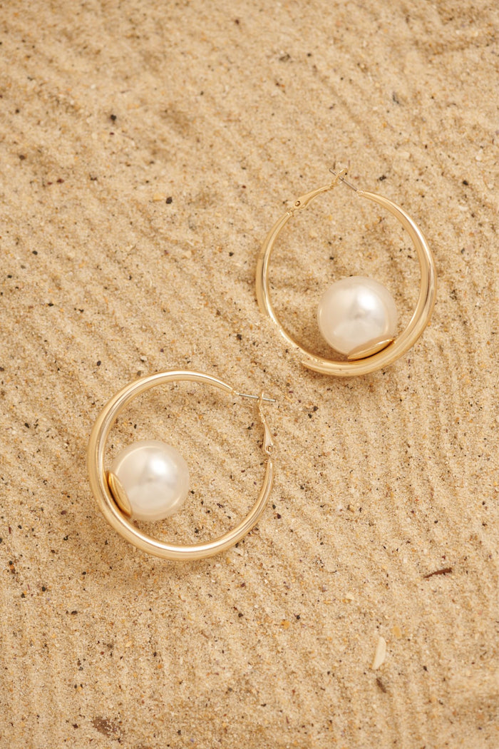 Sandra Hoop Earrings in Gold with Pearl focus shoot flatlay