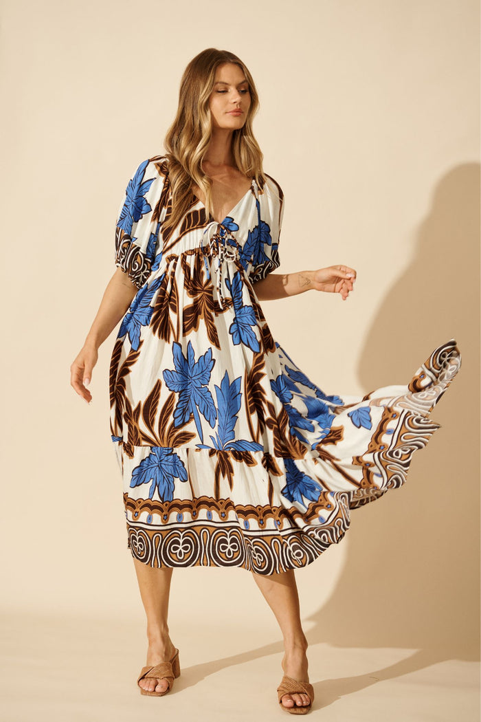Juna Maxi Dress in Blue with Brown Leaf Print focus shoot full length