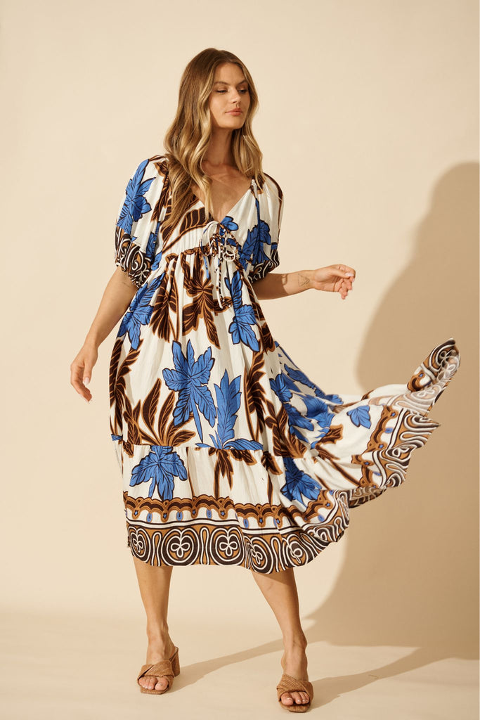 Juna Maxi Dress in Blue with Brown Leaf Print focus shoot full length