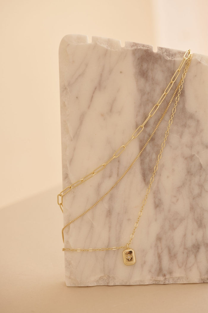 Isla Layered Chain Necklace in Gold focus shoot flatlay