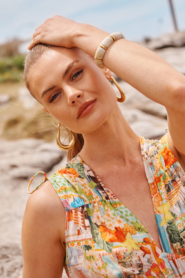 Claudia Chunky Bangle in Cream Marble Resin campaign on model front