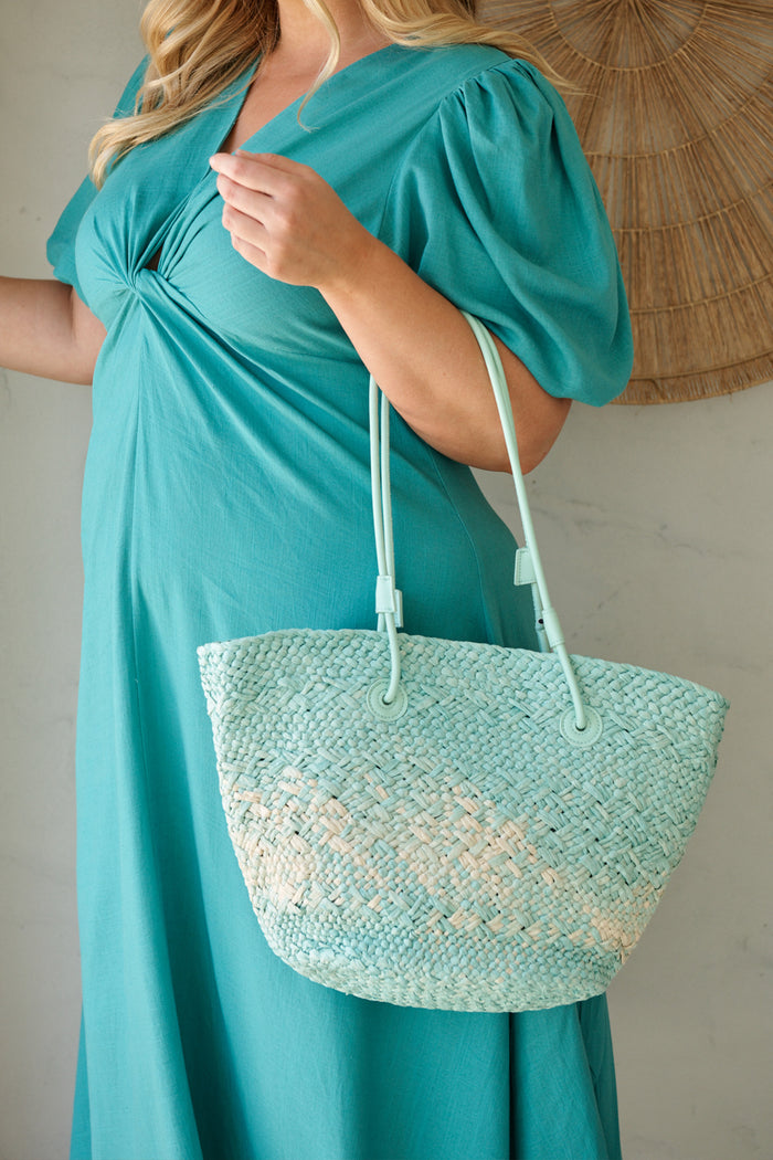 Sorrento Tote Bag in Aqua and Beige Raffia campaign on model front